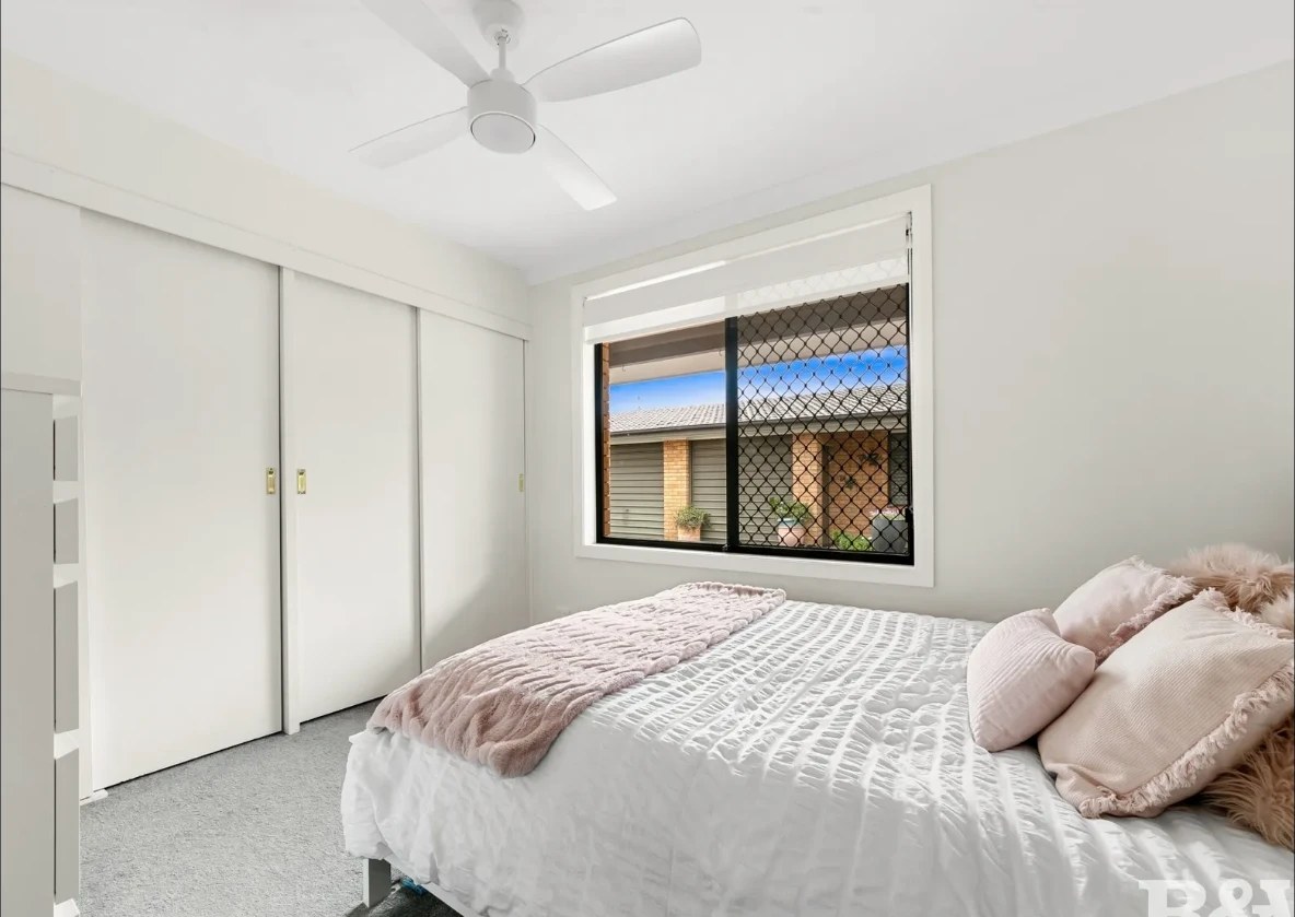 Woy Woy House bedroom in soft neutral layers